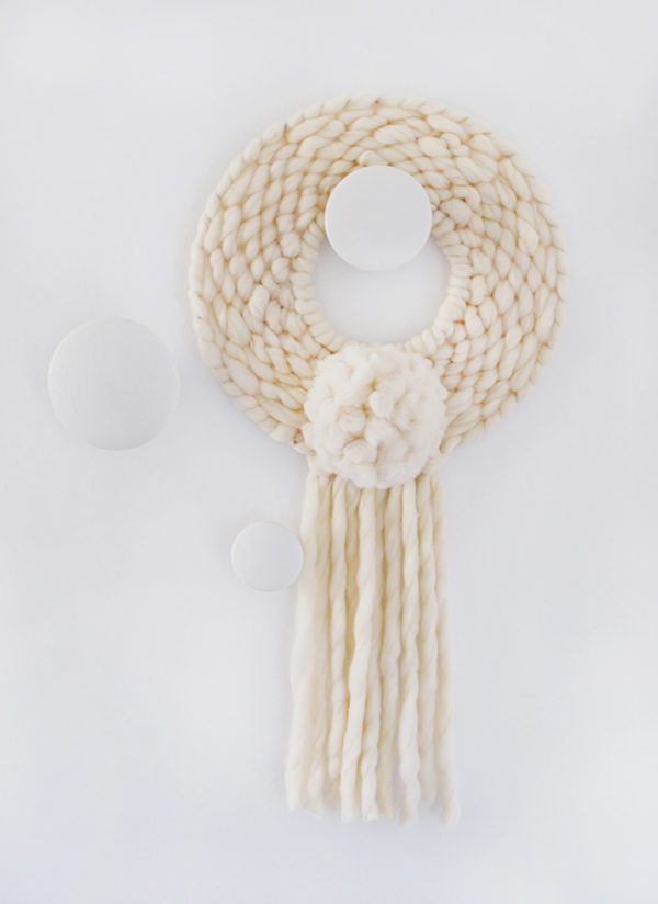 DIY - How to weave a round wall hanging. It's also a modern Christmas wreath!